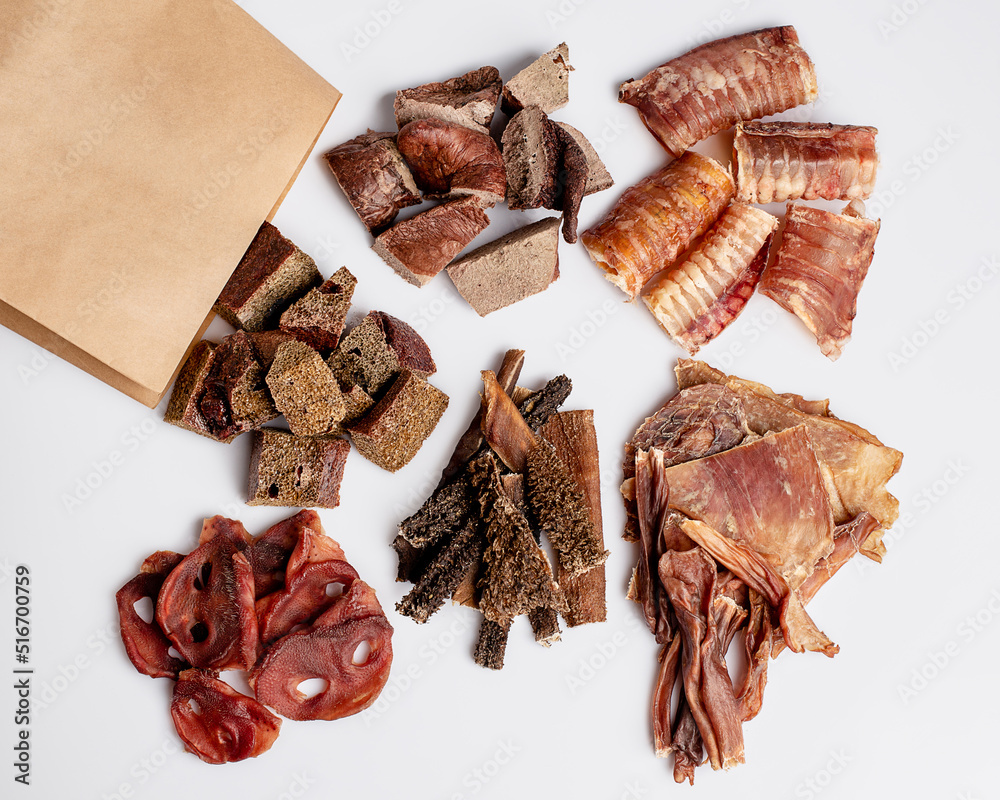 Natural dried treats for dogs. Treats for rewarding and training dogs. Dried meat products for dogs. Animal care.Selective focus. Advertisement for dog treats. Natural dried treats for dogs. Treats for rewarding and training dogs. Dried meat products for dogs. Animal care.Selective focus. Advertisement for dog treats.