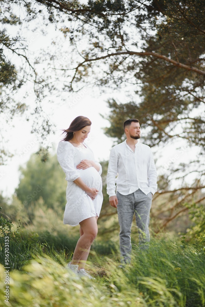 Portrait of lovely future parents during sunset Portrait of lovely future parents during sunset