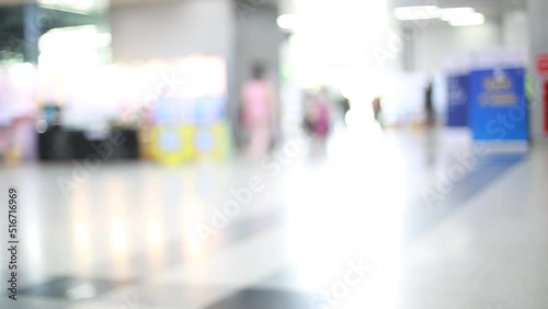 Wallpaper Mural Blurry video of Many people walking in exhibition events or fairs. Blurred, defocused background of public hall,. Torontodigital.ca