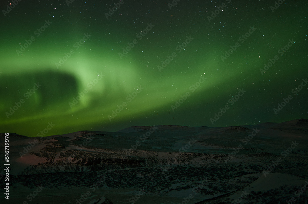 Aurora over the extinct Grabrok volcano, Iceland