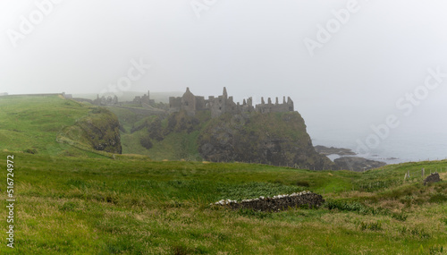 view of Dunluce Castle in thick fog on the Causeway Coastal Route