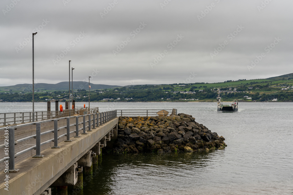 the Lough Foyle Ferry arriving at the pier at Magilligan Point from Ireland