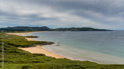 view of the beautiful Ballymastocker Beach on the western shroes of Lough Swilly in Ireland photo