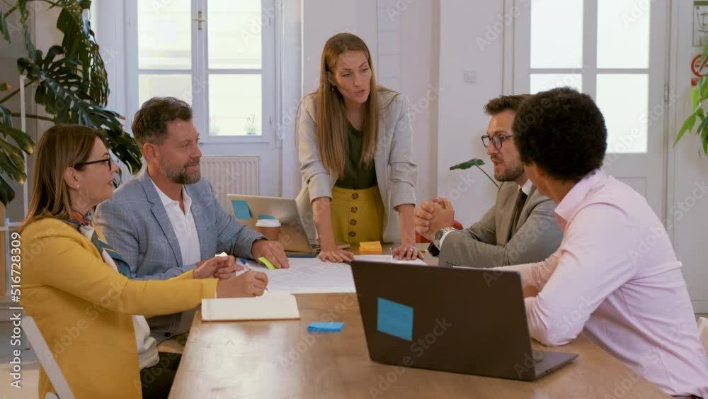 Group of business people working in office. Group of business people working in office.