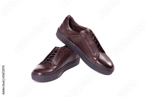Men's brown leather shoes isolated on white background, with copy space and text.