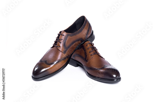 Men's classic brown leather shoes isolated on white background. copy space