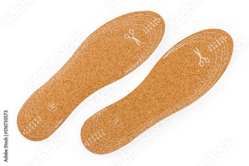 Top view of corkwood and textile insoles of universal size