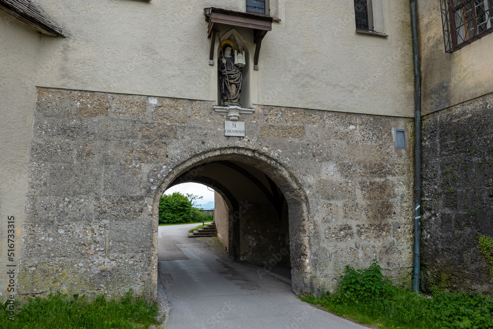 Old passageway with the statue of Saint Erentrude above in Salzburg, Austria