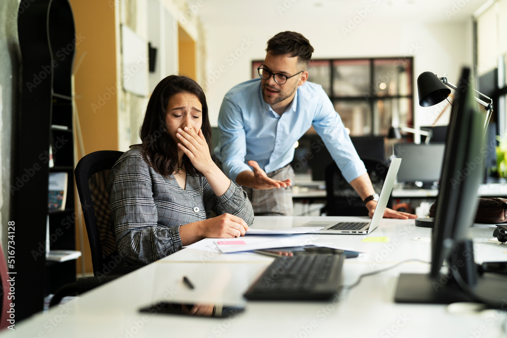 Colleagues arguing in office. Angry businessman yelling at his collegue. Colleagues arguing in office. Angry businessman yelling at his collegue.