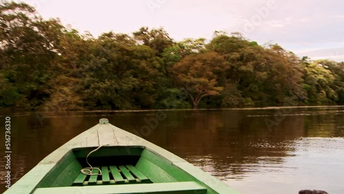 The bow of a boat as you are transported in the Anavilhanas National Park in the Rio Negro of Brazil's Amazon rainforest photo