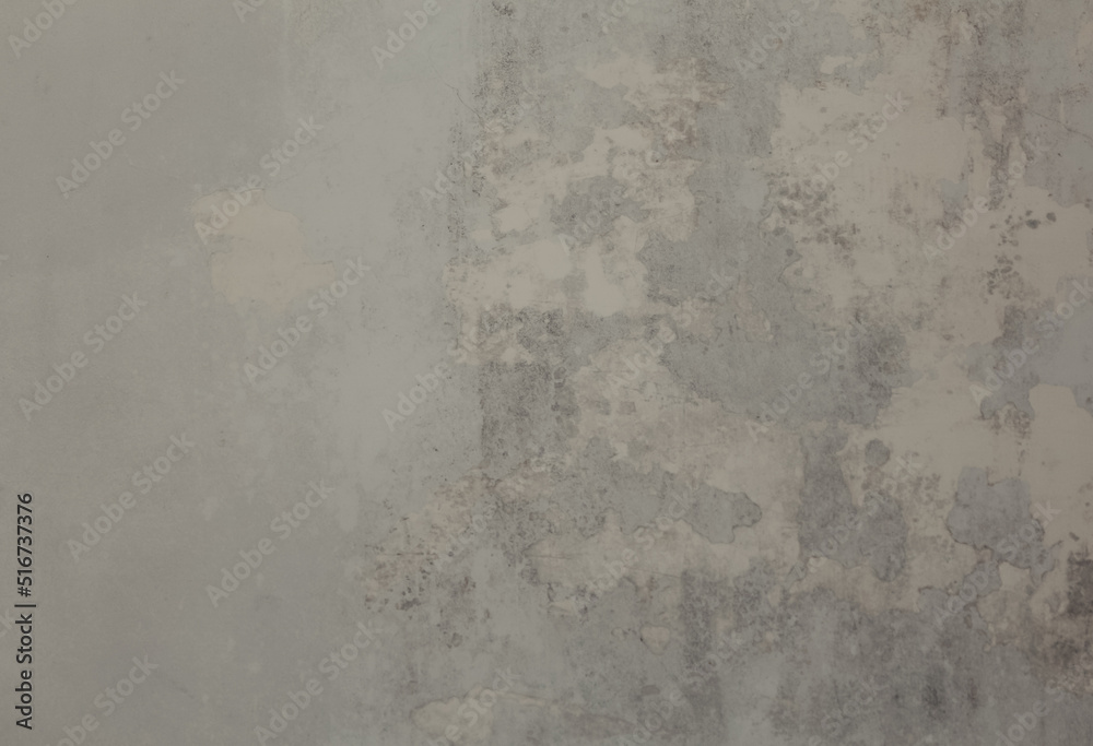 Naklejka premium Weathered cement wall texture with scratches and damages. An old concrete wall background.