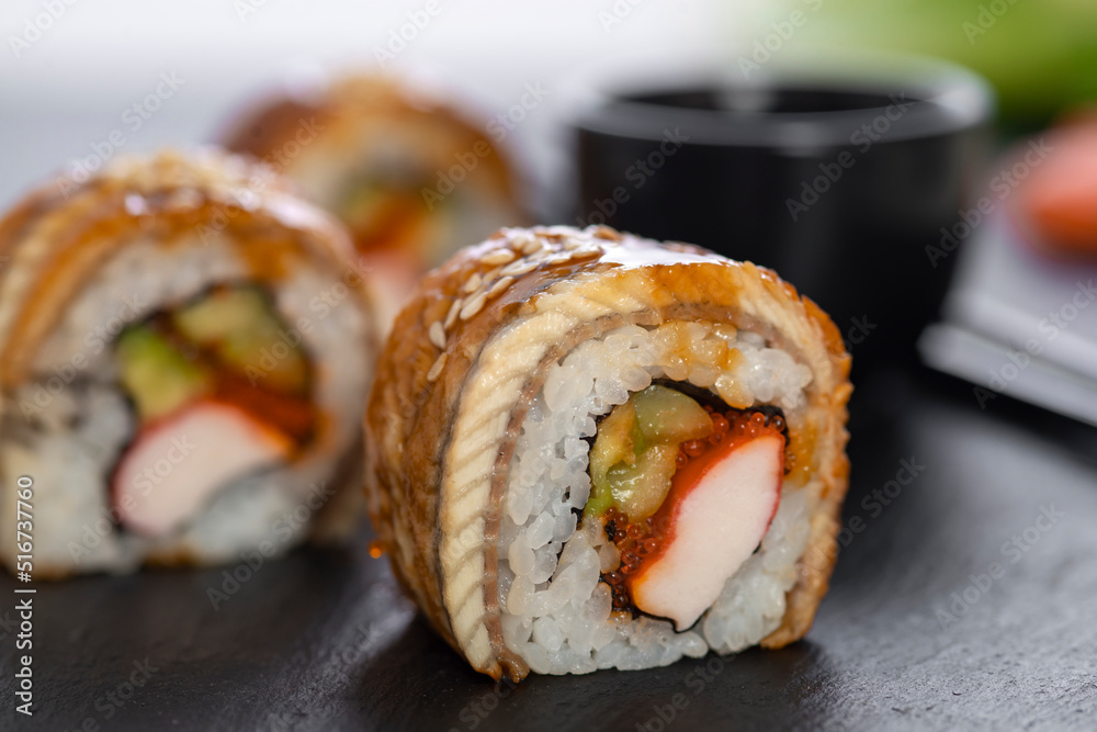 Sushi roll with rice, crab, cucumber. Sushi menu. Japanese food.