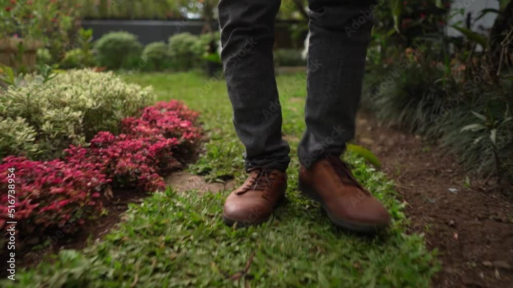 Front view feet of man with brown leather shoe. Confident guy walking in leather shoes. Front view feet of man with brown leather shoe. Confident guy walking in leather shoes.