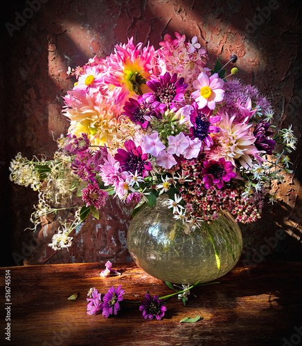Bouquet with dahlias, anemone, montbrecia, stonecrop, clematis, aster, phlox