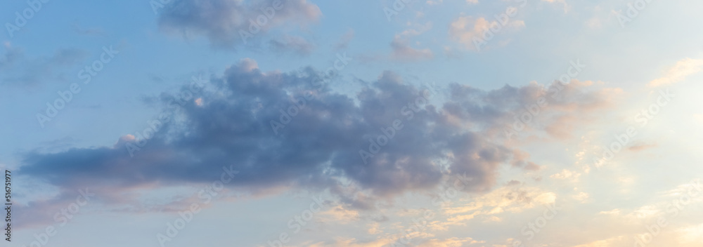 Dark cloud in blue sky during sunset