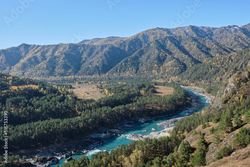 Turquoise river Katun in the mountains.