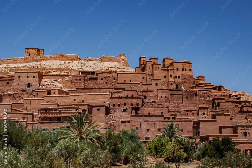 Ksar of Ait-Ben-Haddou, caravan route between the Sahara and Marrakech in Atlas Mountains, Ouarzazate Province, Morocco, Africa. Organic mud-built Berber village of merchants' houses known as kasbahs.
