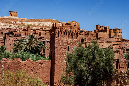Ksar of Ait-Ben-Haddou, caravan route between the Sahara and Marrakech in Atlas Mountains, Ouarzazate Province, Morocco, Africa. Organic mud-built Berber village of merchants' houses known as kasbahs. photo