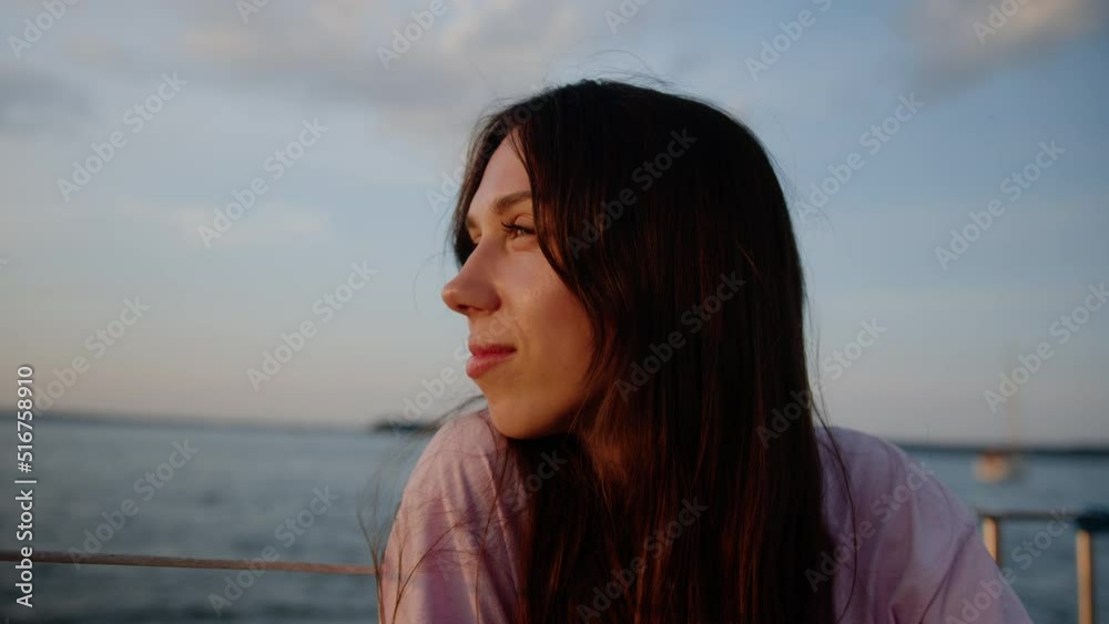 A beautiful young woman is resting while walking on a yacht A beautiful young woman is resting while walking on a yacht