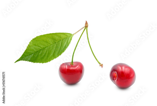 Ripe cherries with leaf  one berry is torn off. Isolated on white background. Parting  separation  breakup concept.