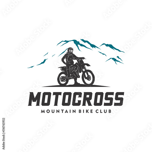 Motocross silhouette in the mountain logo design template