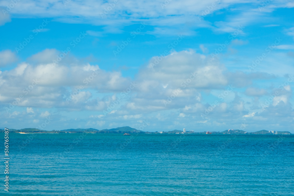 Turquoise sea background with blue sky fluffy cloud nature landscape