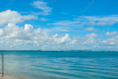 Turquoise sea background with blue sky fluffy cloud nature landscape © themorningglory