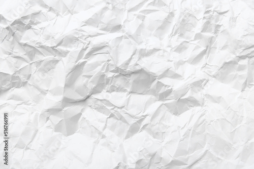 Sheet of white crumpled paper as background  closeup