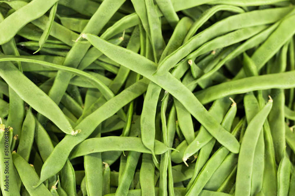 green romano beans on the counter in the market green romano beans on the counter in the market