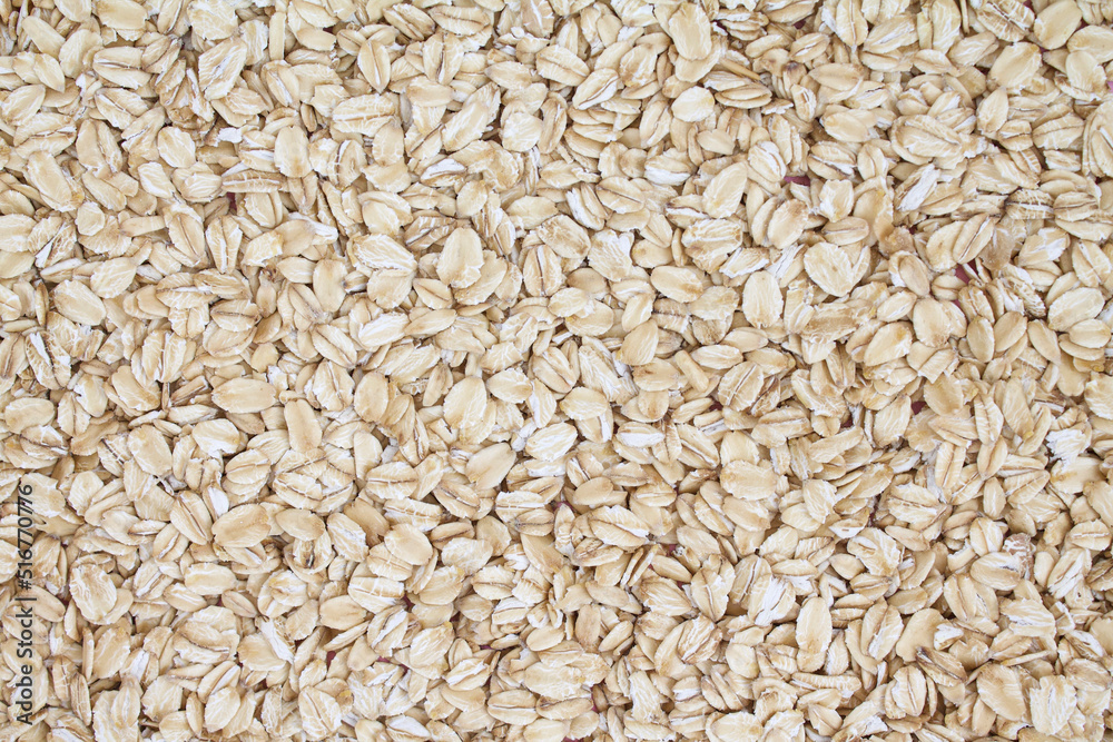 Close up top view rolled oats texture background, oat flakes, oatmeal Close up top view rolled oats texture background, oat flakes, oatmeal
