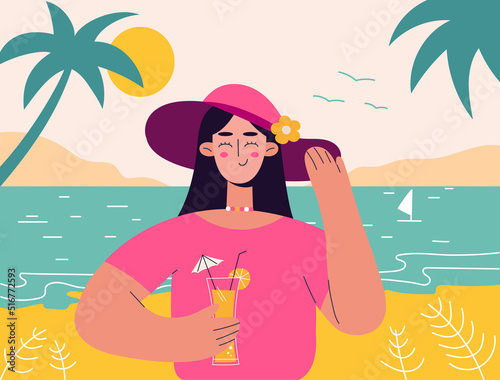 Woman on summer vacation concept. Pretty Girl  holds cocktail in her hand. Concept for outdoor activities and summer travel topics.


