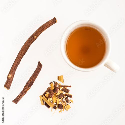 Tea and stems of licorice - Glycyrrhiza glabra. photo