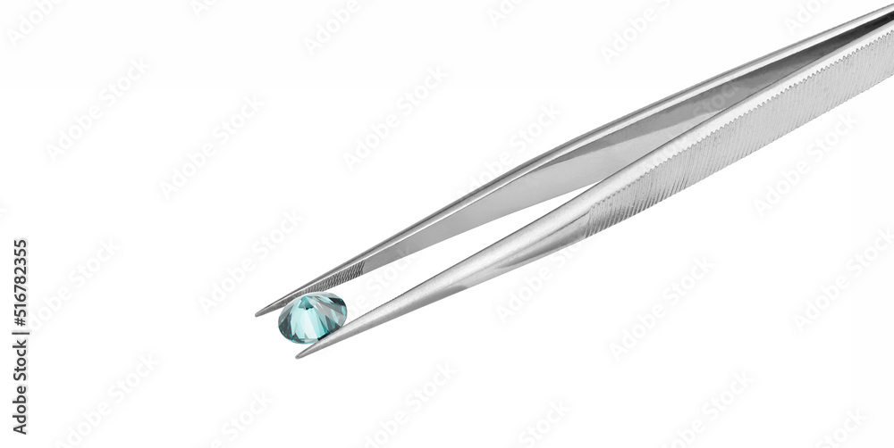 Blue Diamond in Tweezers on White Background Blue Diamond in Tweezers on White Background