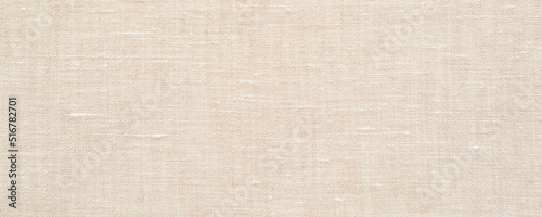 Beige or undyed linen fabric texture background photo