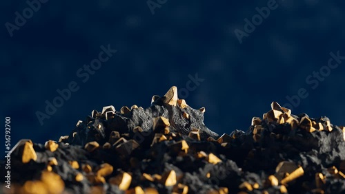 Gold pieces in the rocks. A gold mine. Noble metal. Golden nuggets. Gold ore. photo