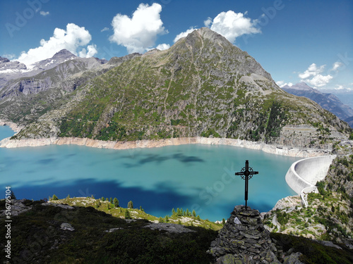 Panoramic view of Mountains around Emosson lake, Valais, Switzerland, Swiss Alps, Barrage d'Emosson, Cross, monument, burial.