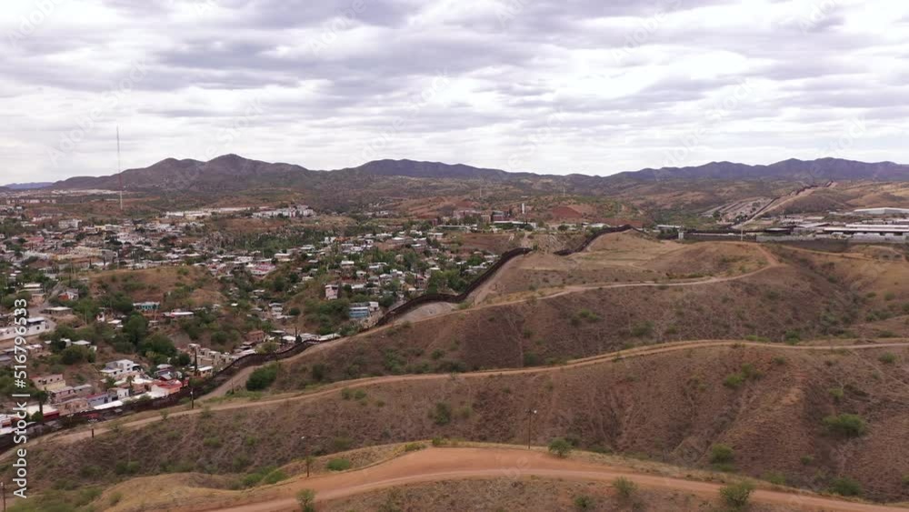 Nogales Arizona, USA and Mexico. US Mexico border. Fence divides both countries. Nogales Arizona, USA and Mexico. US Mexico border. Fence divides both countries.