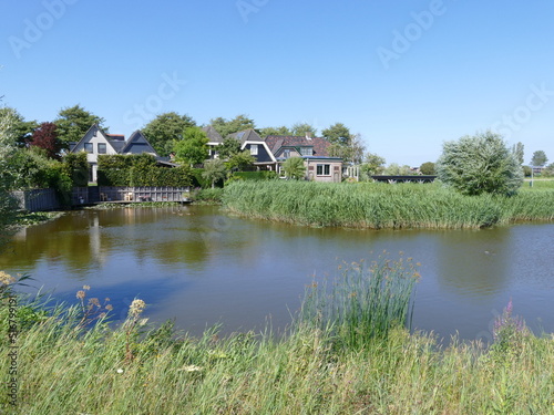 Picturesque landscape of waterways and greenery in Tuitjenhorn, North Holland, The Netherlands