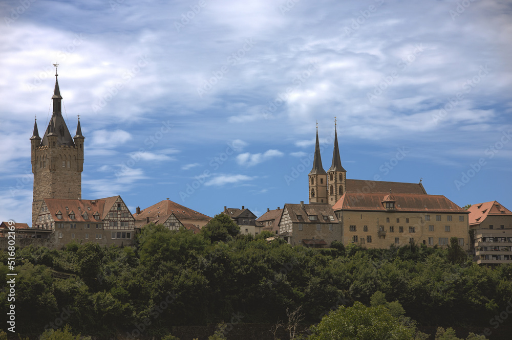 View of the old church and the historic town wall of Bad Wimpfen at summer View of the old church and the historic town wall of Bad Wimpfen at summer