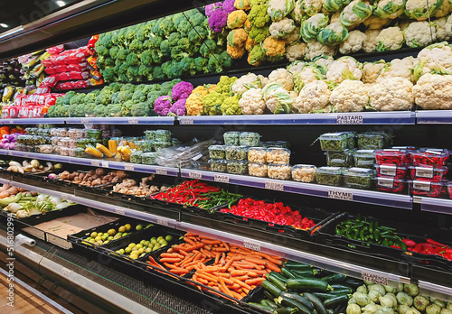 Wallpaper Mural Fresh vegetable counter in supermarket. Fruits and vegetables on shop stand in supermarket grocery store Torontodigital.ca