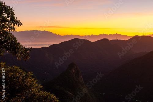 Beautiful sunrise view from rainforest mountainin Tijuca Park photo