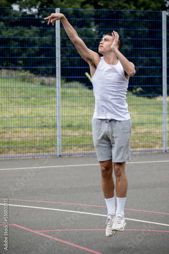 A Nineteen Year Old Teenage Boy Playing Basketball