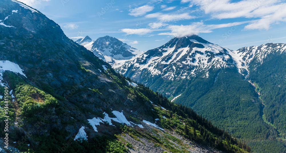 A view of the mountains leading from the Denver glacier close to Skagway, Alaska in summertime