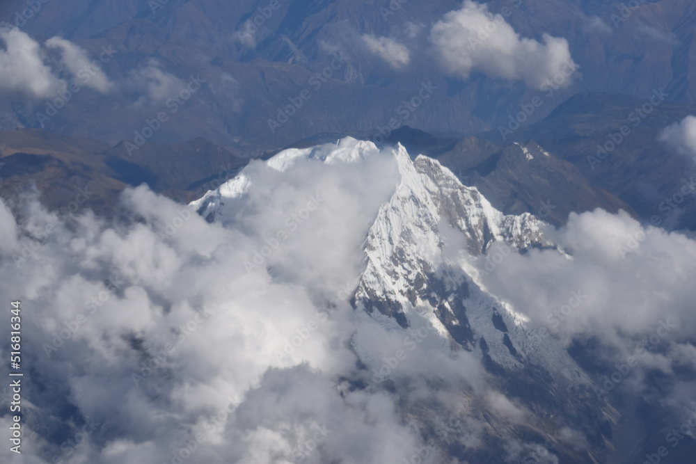 Snowcapped mountain peaks in the Andes Mountain chain in Peru Snowcapped mountain peaks in the Andes Mountain chain in Peru