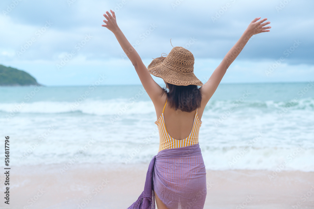 Young Beautiful woman in Bikini enjoying and relaxing on the beach, Summer, vacation, holidays, Lifestyles concept. Young Beautiful woman in Bikini enjoying and relaxing on the beach, Summer, vacation, holidays, Lifestyles concept.