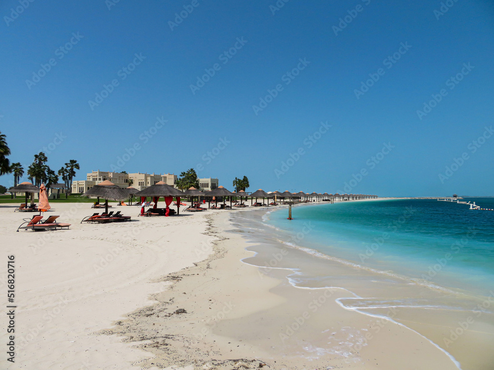 beach with umbrellas and chairs beach with umbrellas and chairs