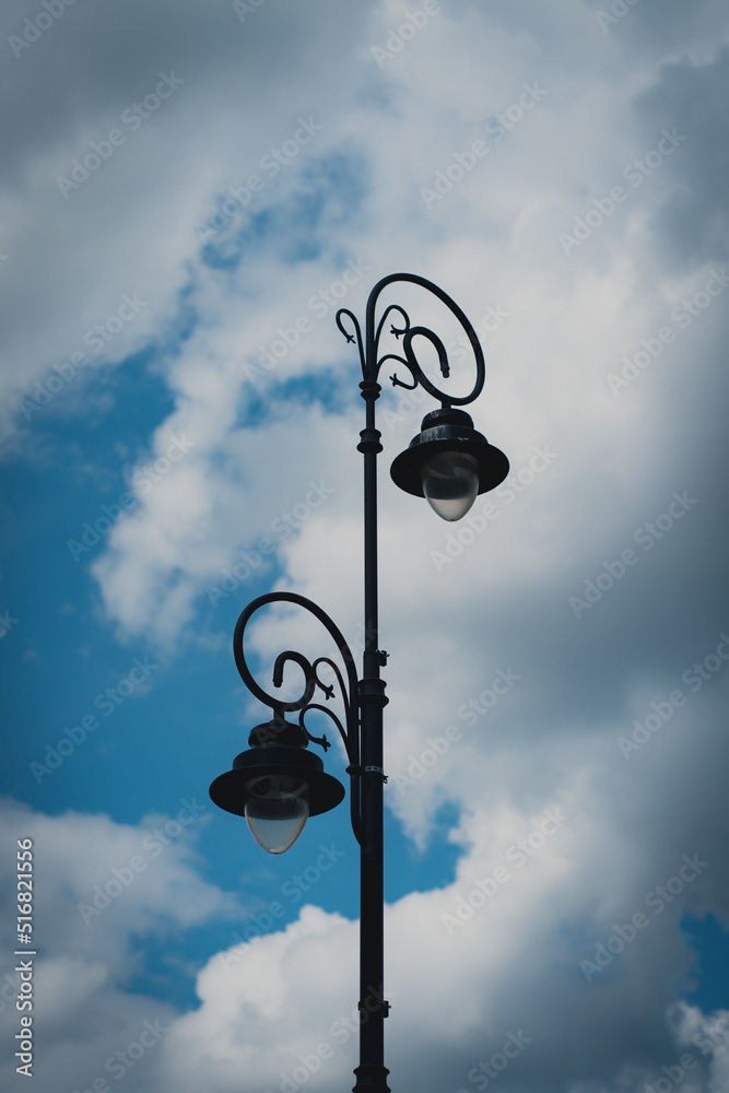 street lamp on blue sky