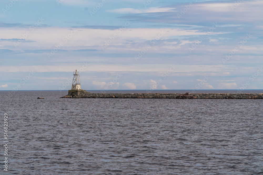 Russia. Leningrad region. May 29, 2022. Lighthouse at the exit to Lake Ladoga from Vladimir Bay.