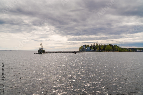 Russia. Leningrad region. May 29, 2022. Lighthouse at the exit to Lake Ladoga from Vladimir Bay. © yurisuslov