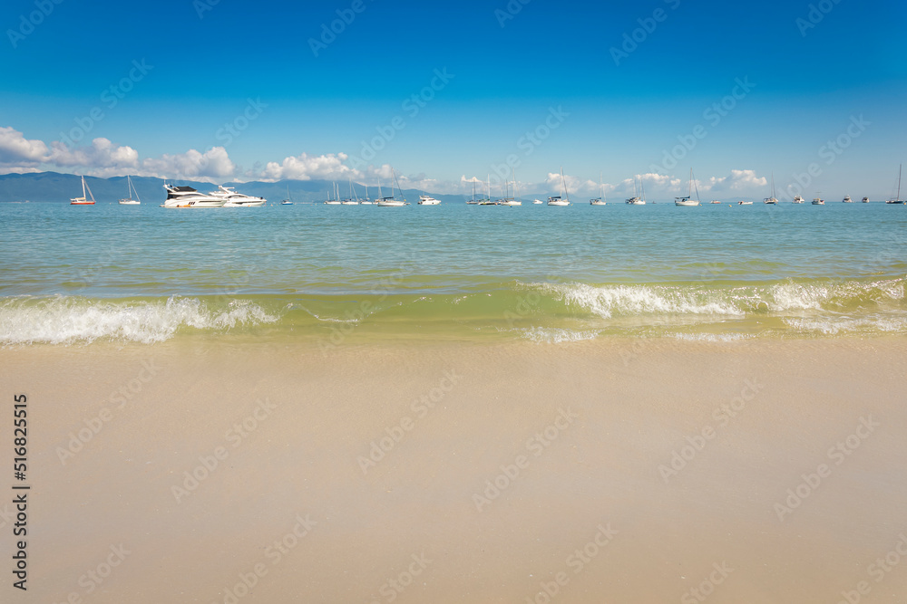 Boats and sailboats in Jurere beach Florianopolis, Brazil